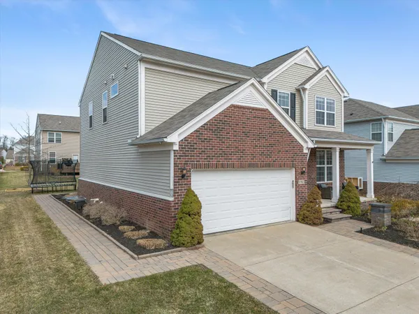 $635,000 | 57662 Village Drive, New Hudson, MI 48165