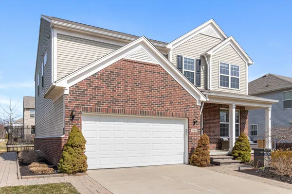 $635,000 | 57662 Village Drive, New Hudson, MI 48165