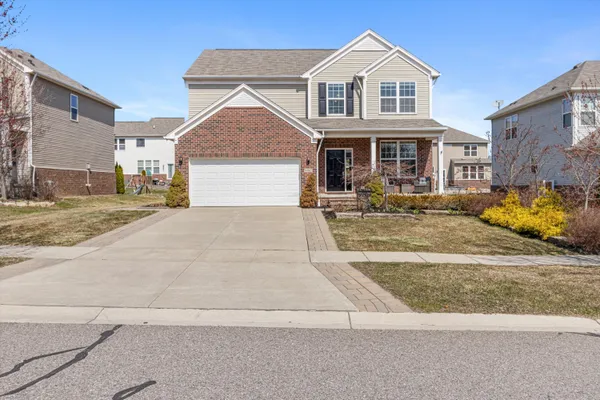 $635,000 | 57662 Village Drive, New Hudson, MI 48165