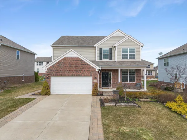 $635,000 | 57662 Village Drive, New Hudson, MI 48165
