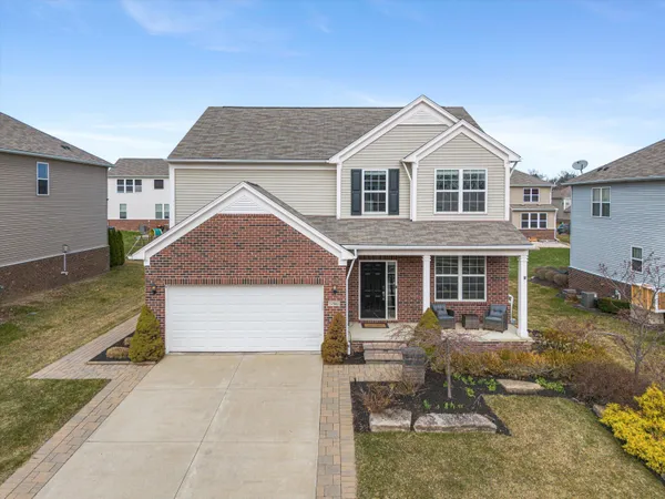 $635,000 | 57662 Village Drive, New Hudson, MI 48165