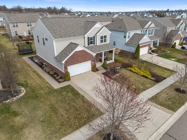 $635,000 | 57662 Village Drive, New Hudson, MI 48165