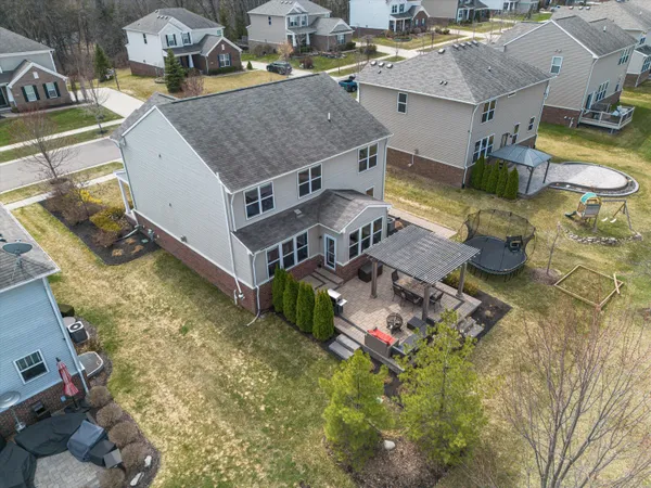 $635,000 | 57662 Village Drive, New Hudson, MI 48165