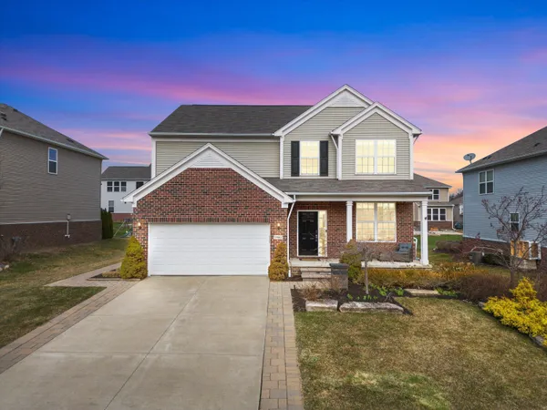 $635,000 | 57662 Village Drive, New Hudson, MI 48165