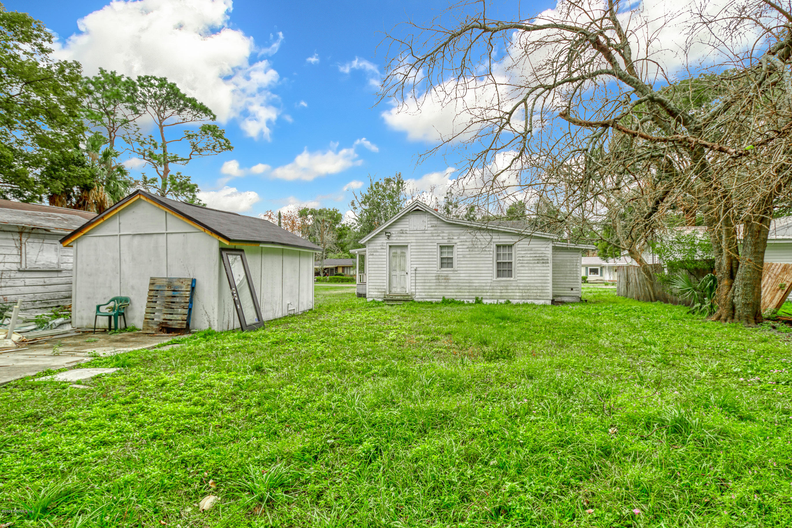 4571 Appleton Avenue Jacksonville, FL 32210 - Photo 29 of 30 a view of a house with backyard
