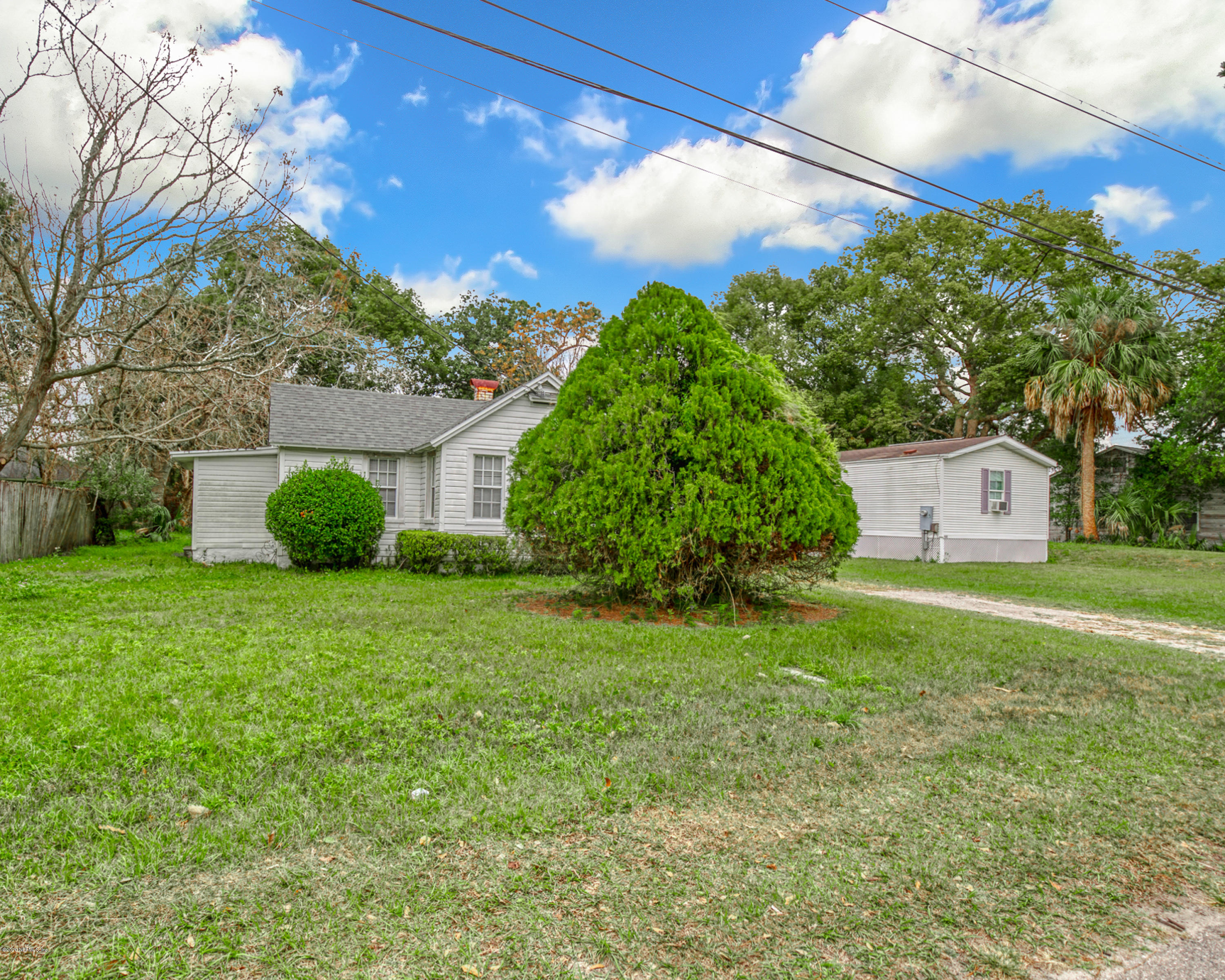 4571 Appleton Avenue Jacksonville, FL 32210 - Photo 30 of 30 a view of a house with a yard