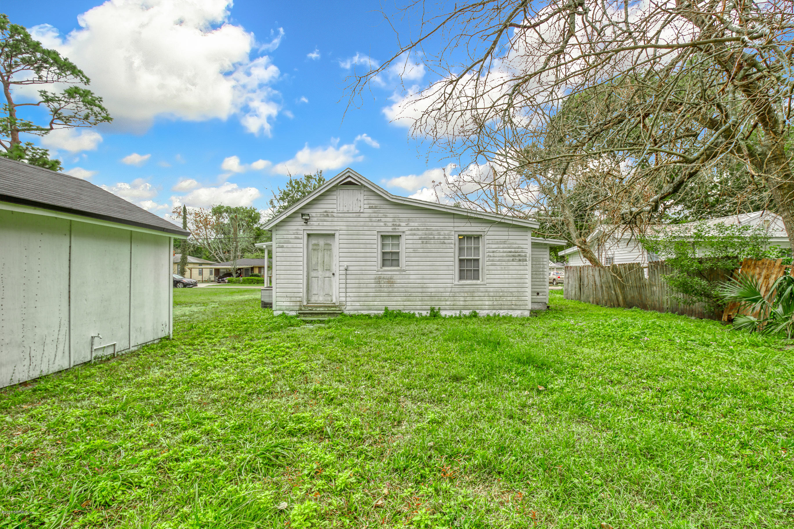 4571 Appleton Avenue Jacksonville, FL 32210 - Photo 3 of 30 a view of a house with backyard and garden