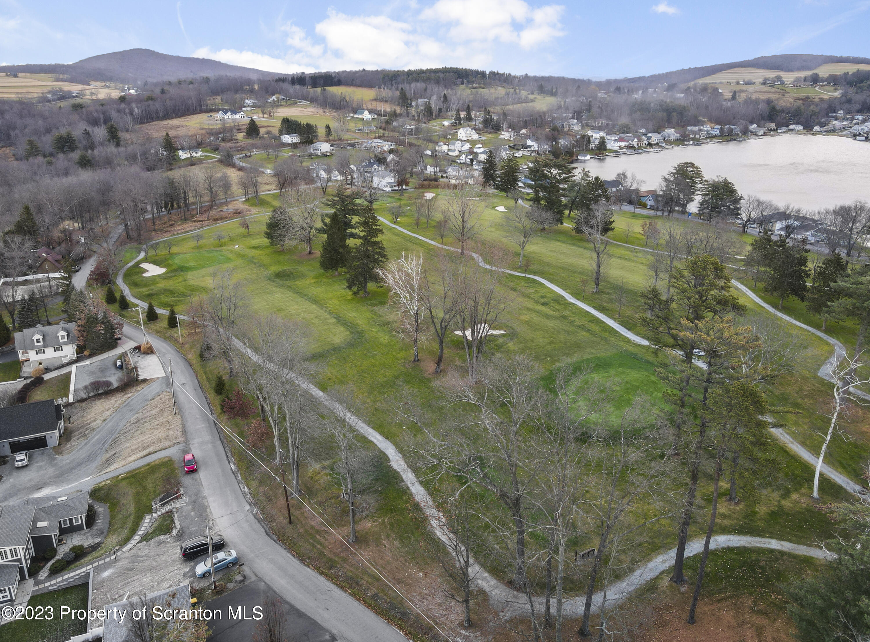 210 Point Rd Lake Factoryville, PA 18419 - Photo 83 of 94 a view of a lake with a yard