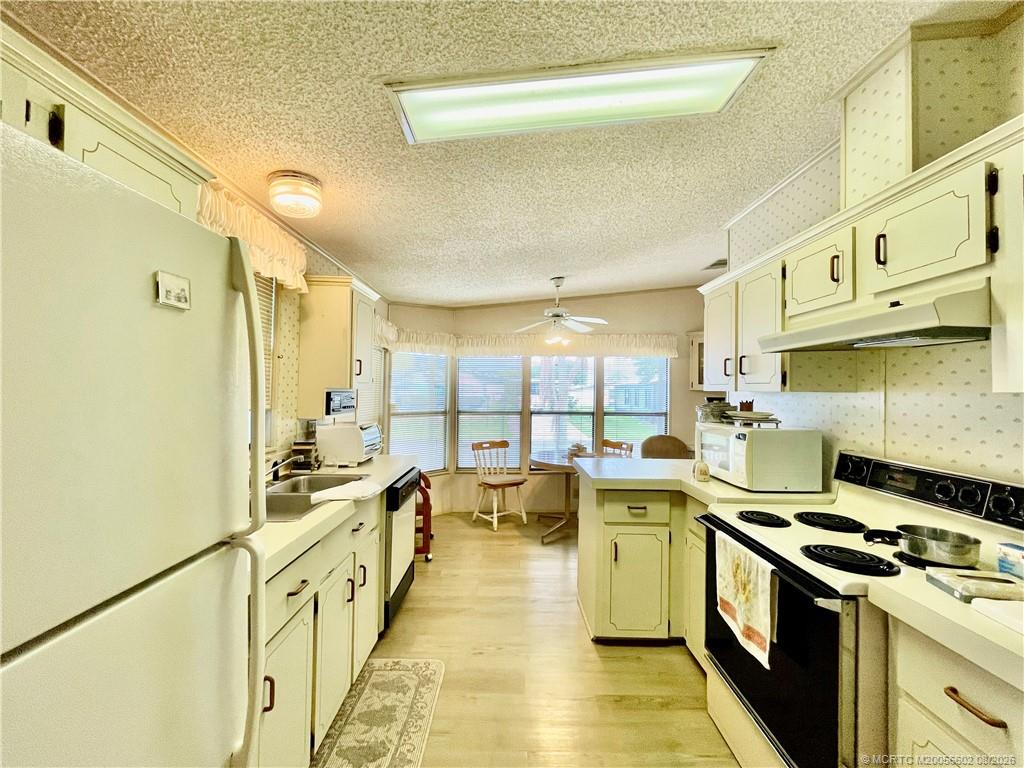 14464 Southwest Rake Drive Indiantown, FL 34956 - Photo 4 of 36 Gallery Image 4