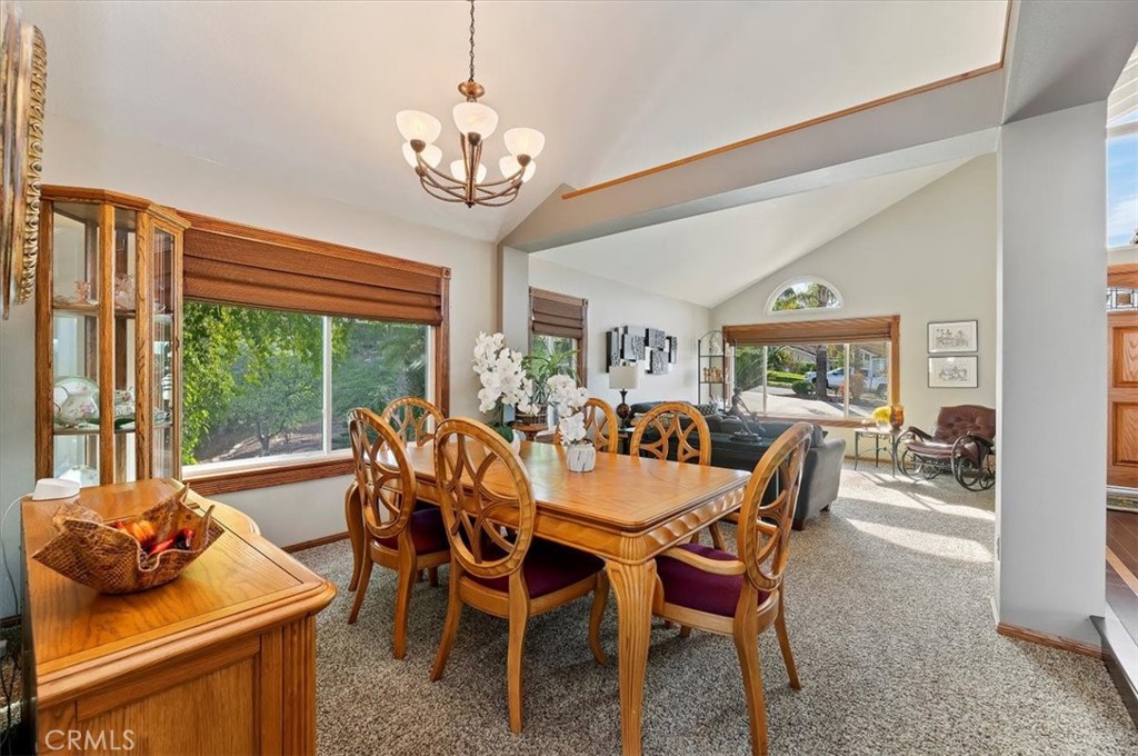1793 Praed Street Riverside, CA 92503 - Photo 17 of 75 a view of a dining room with furniture window and outside view