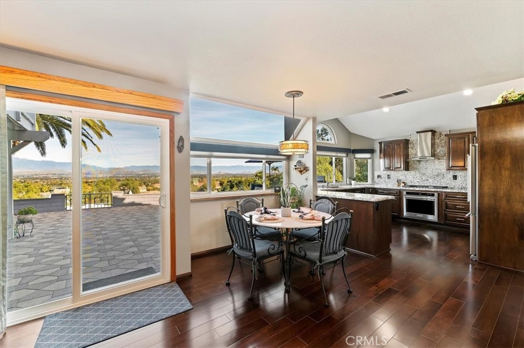 1793 Praed Street Riverside, CA 92503 - Photo 24 of 75 a view of a dining room with furniture window and wooden floor