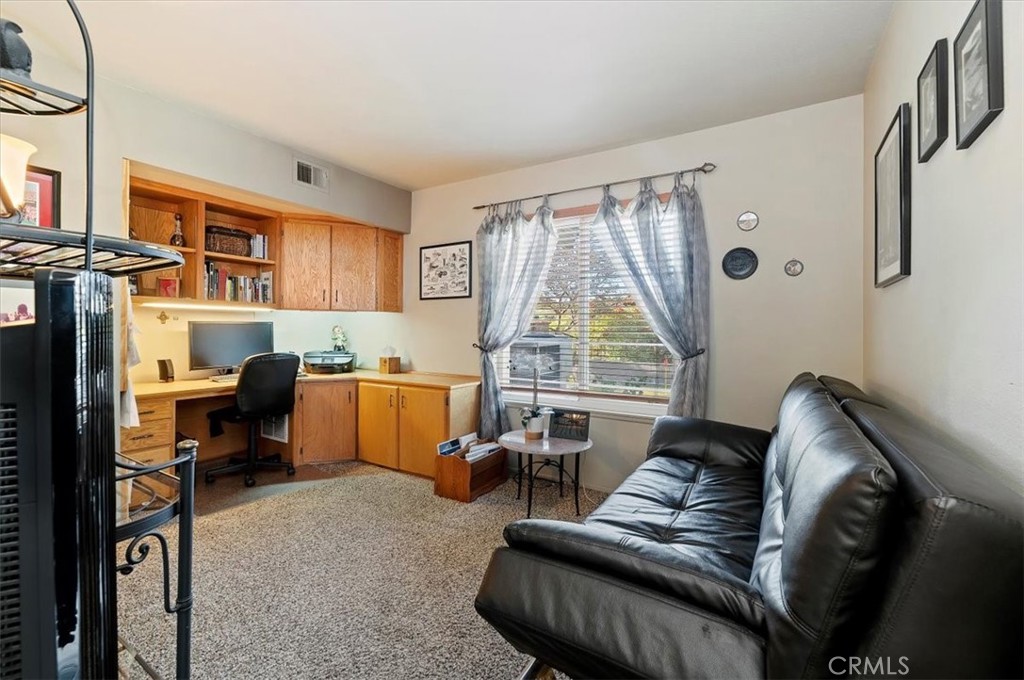 1793 Praed Street Riverside, CA 92503 - Photo 28 of 75 a living room with furniture and a large window