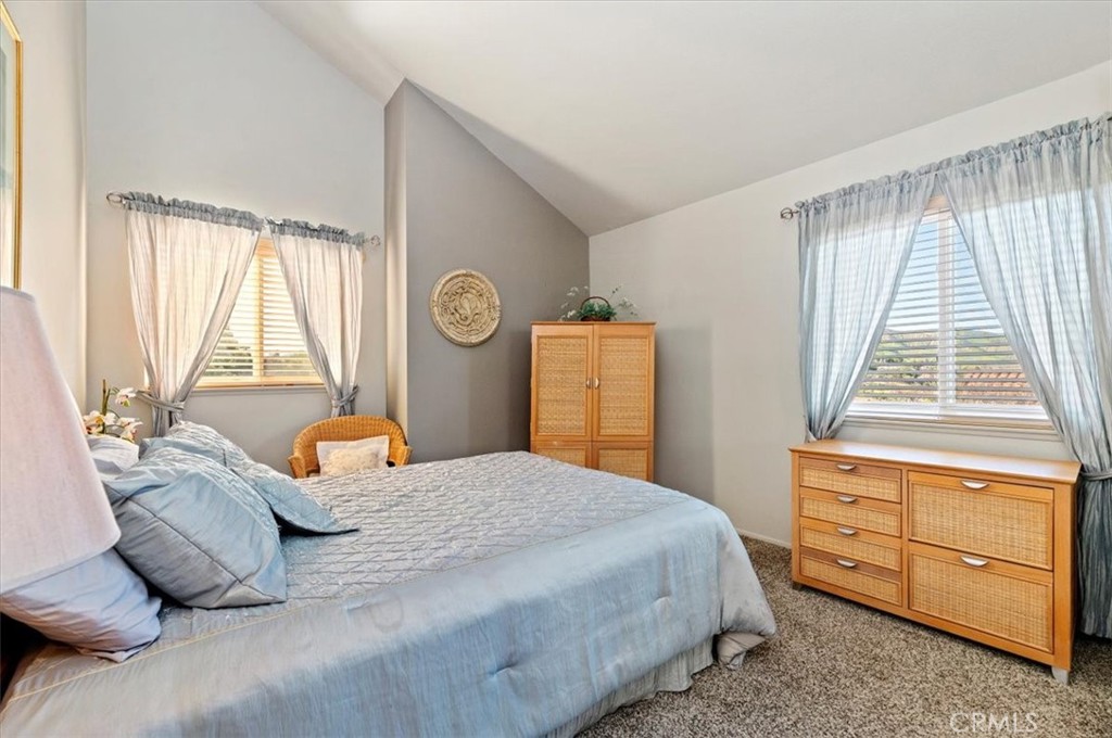 1793 Praed Street Riverside, CA 92503 - Photo 31 of 75 a bedroom with a bed and wooden floor