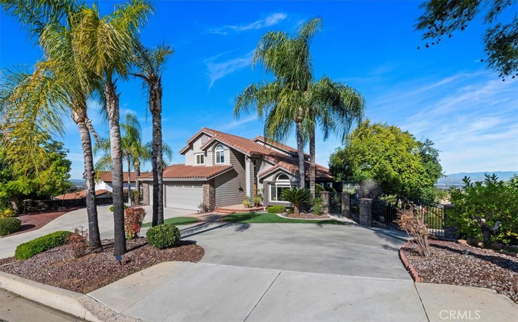 1793 Praed Street Riverside, CA 92503 - Photo 7 of 75 a front view of a house with a garden