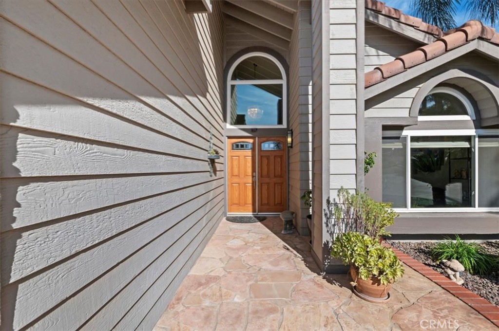 1793 Praed Street Riverside, CA 92503 - Photo 9 of 75 a front view of a house with a garden
