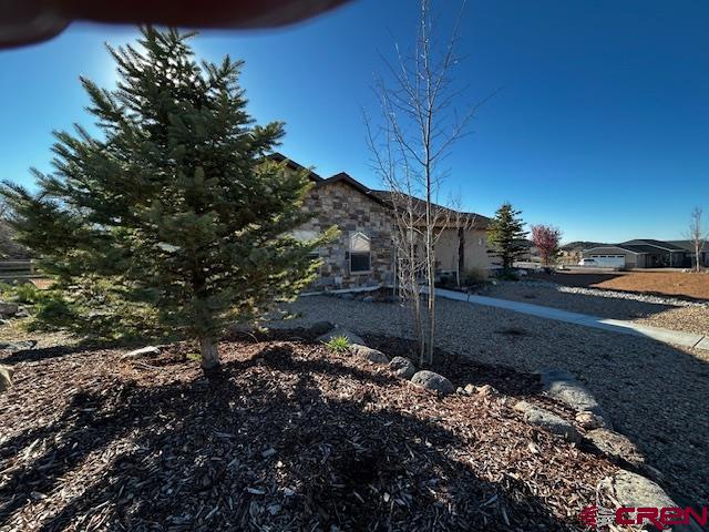 300 Southeast Sandstone Court Cedaredge, CO 81413 - Photo 11 of 38 a view of a road with a yard