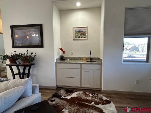 300 Southeast Sandstone Court Cedaredge, CO 81413 - Photo 21 of 38 a room with a couch and a stove