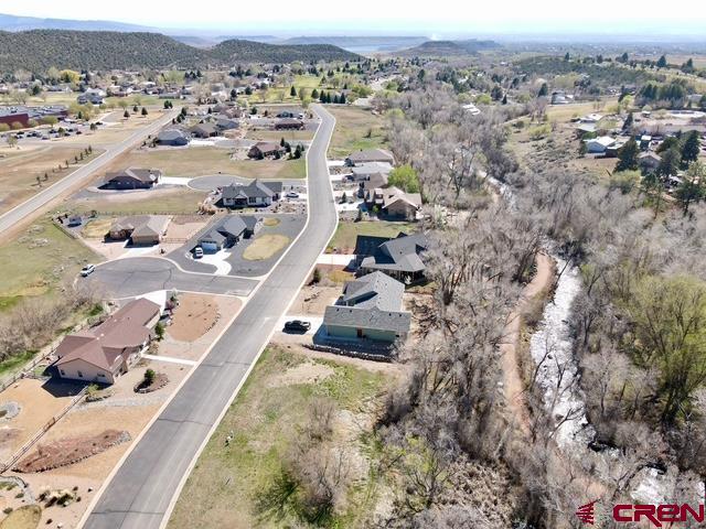 300 Southeast Sandstone Court Cedaredge, CO 81413 - Photo 35 of 38 an aerial view of residential houses with outdoor space