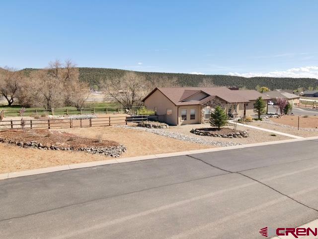 300 Southeast Sandstone Court Cedaredge, CO 81413 - Photo 38 of 38 a view of a terrace with a television
