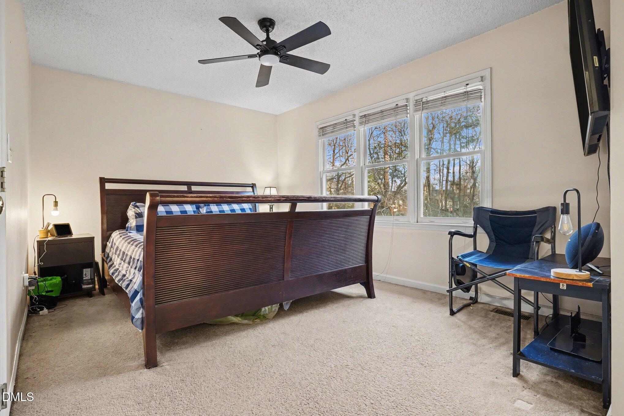1502 Oakland Hills Way Raleigh, NC 27604 - Photo 15 of 26 a view of a workspace with furniture and a window
