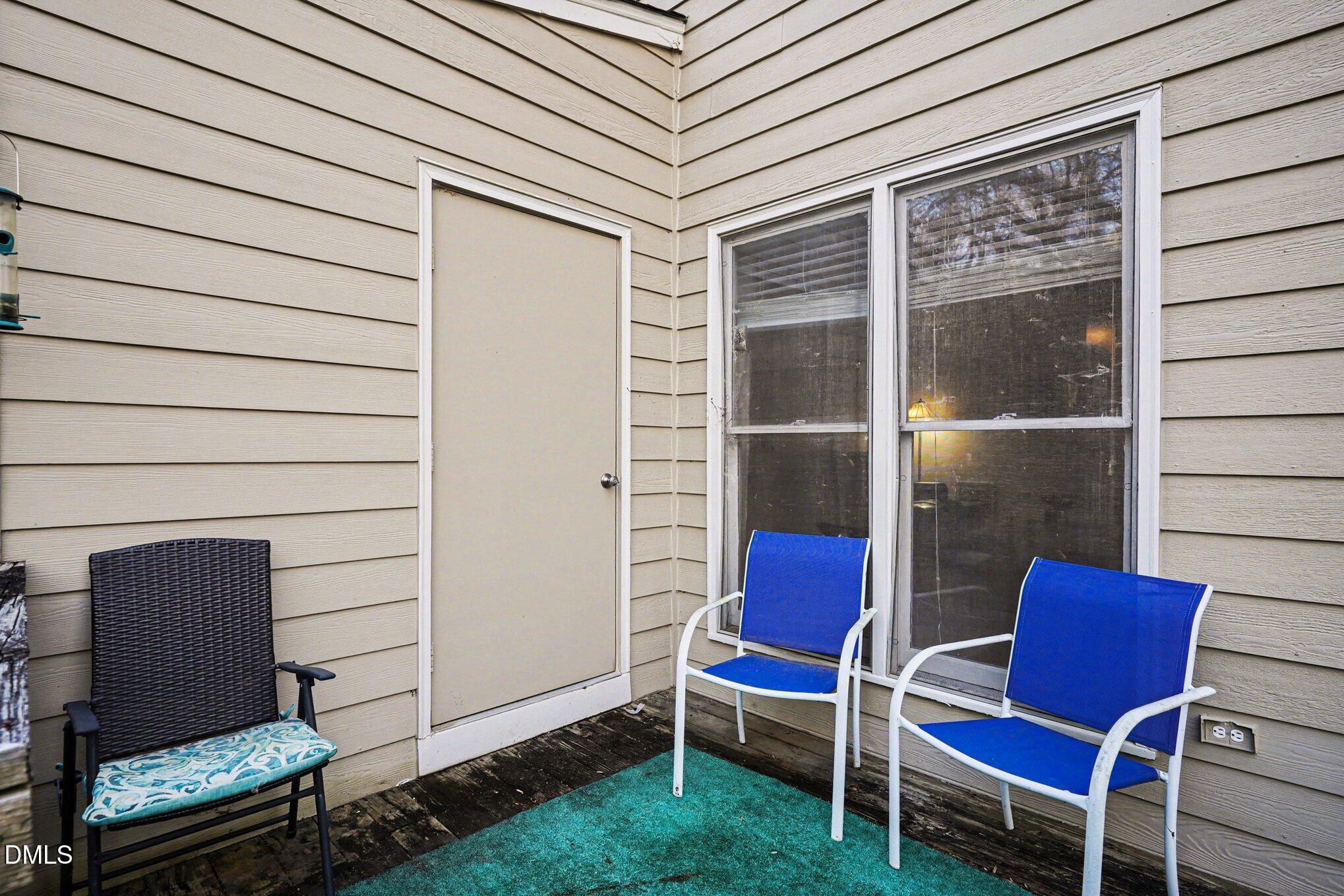 1502 Oakland Hills Way Raleigh, NC 27604 - Photo 25 of 26 a backyard of a house with seating space