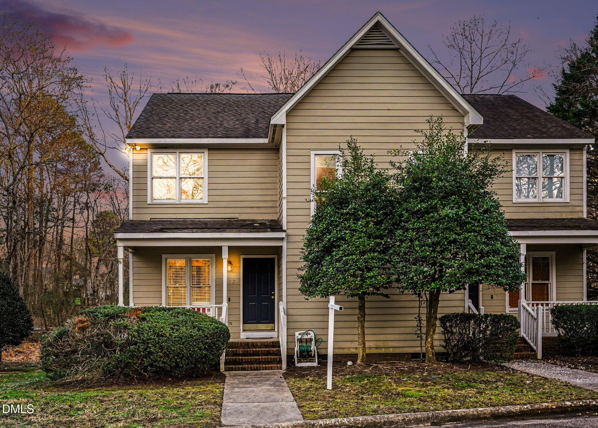 1502 Oakland Hills Way Raleigh, NC 27604 - Photo 26 of 26 a front view of a house with a yard