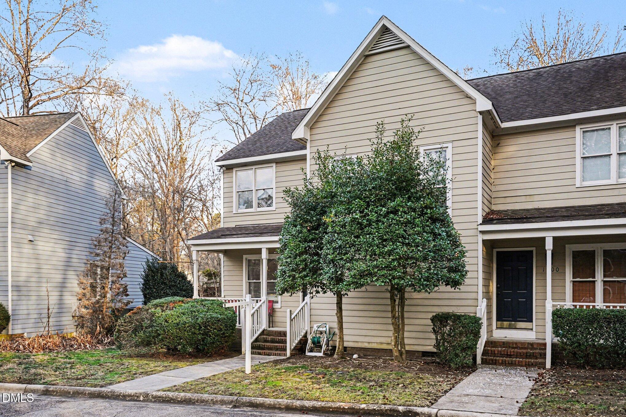 1502 Oakland Hills Way Raleigh, NC 27604 - Photo 3 of 26 a view of house with a yard and sitting area