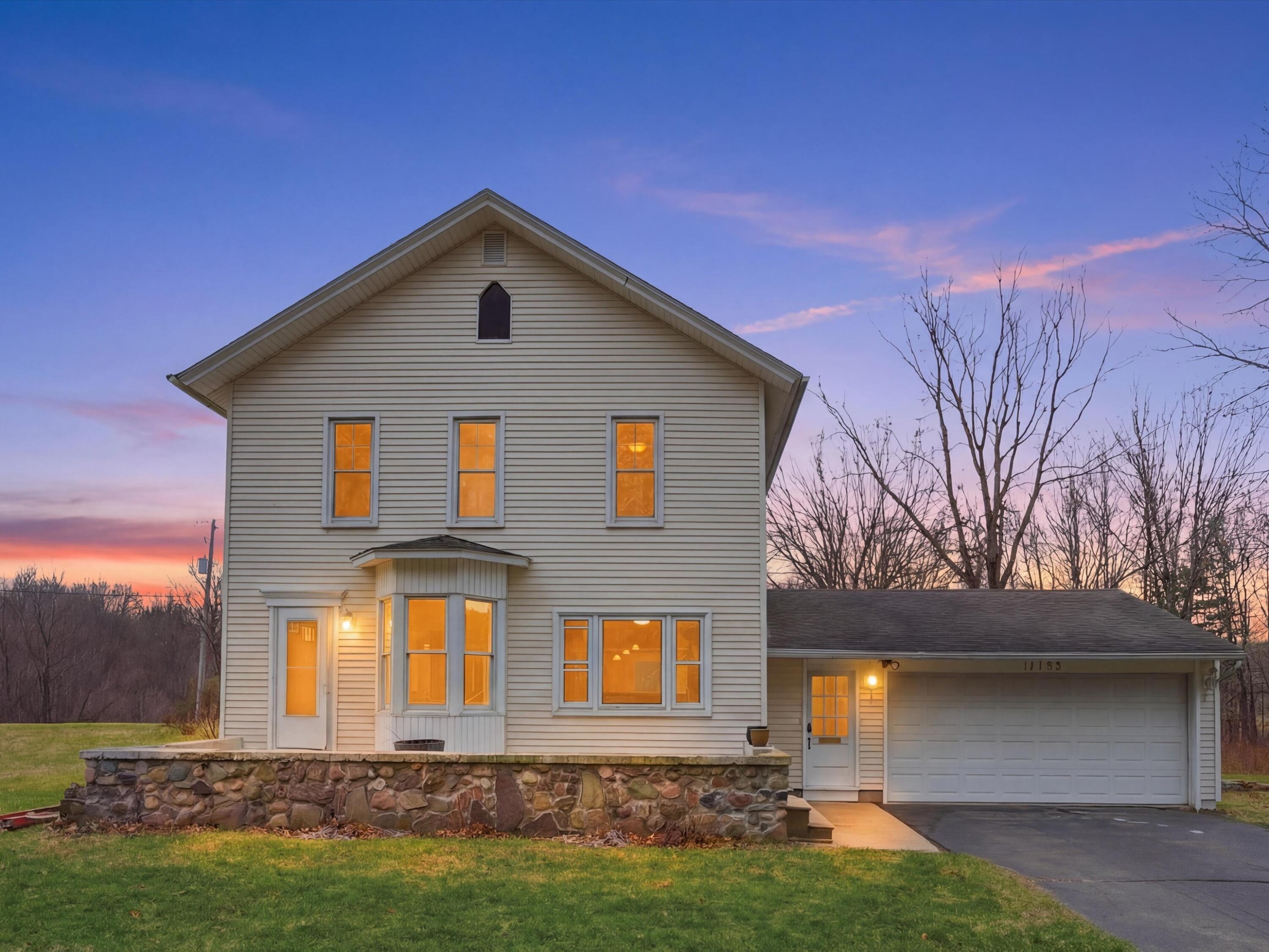 17753 Waterloo Road Chelsea, MI 48118 - Photo 1 of 93 01-DSC02238_reedit_4c31b948-2_twilight_4