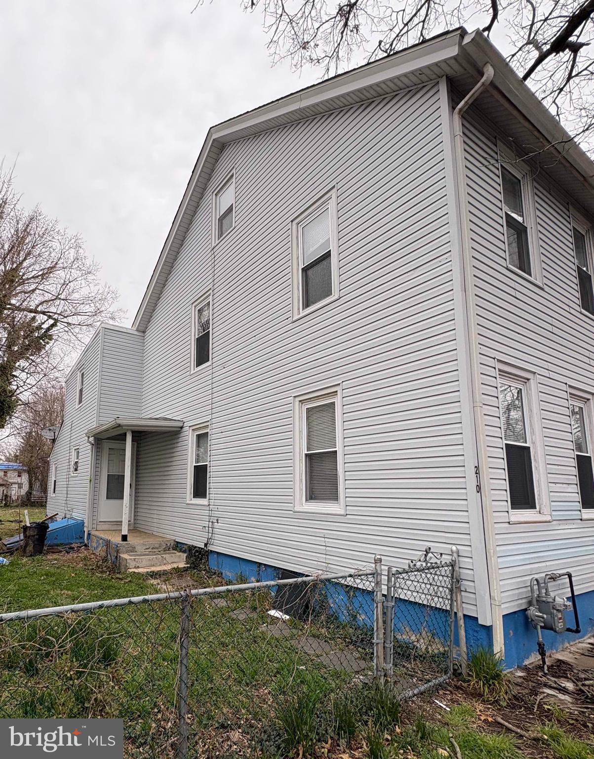 210 Wesley Street Salem, NJ 08079 - Photo 17 of 17 a front view of a house with a yard