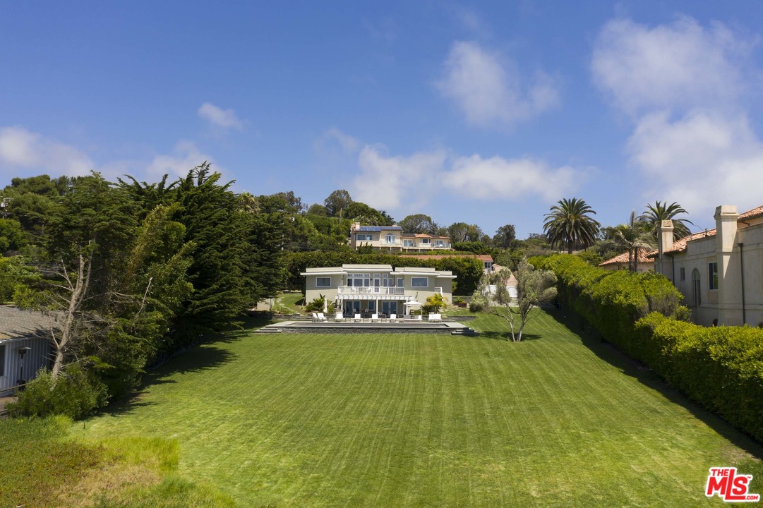 7163 Birdview Avenue Malibu, CA 90265 - Photo 5 of 22 a view of a lake with houses in the back