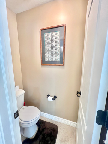 369 Culross Circle Tooele, UT 84074 - Photo 40 of 54 Compact water closet featuring neutral wall paint and light-toned floor tile