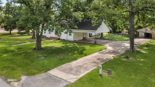 a view of a yard with pool