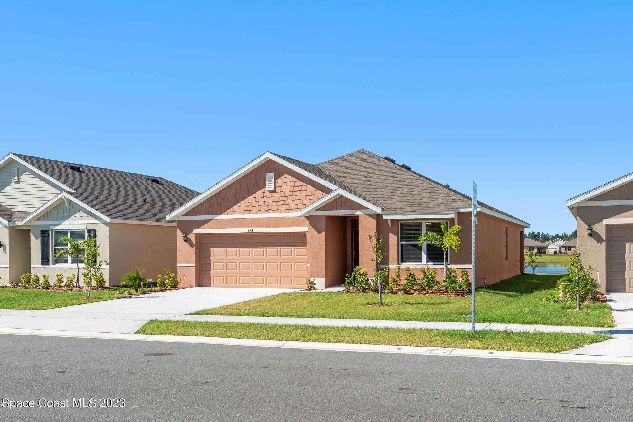 992 Trinity Street Rockledge, FL 32955 - Photo 19 of 19 a front view of a house with a yard