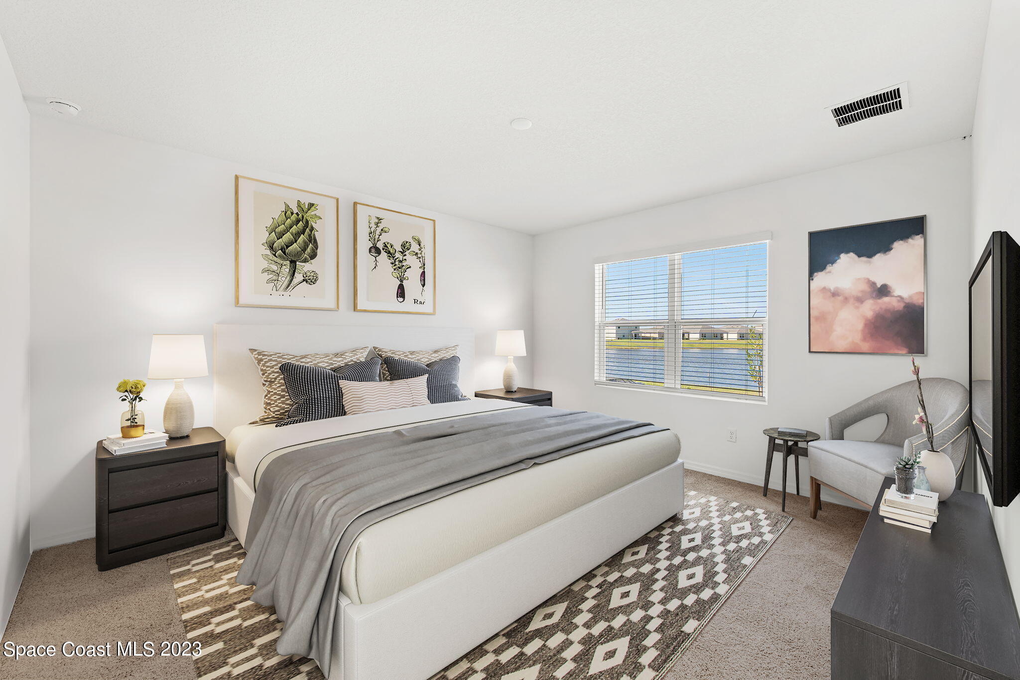 992 Trinity Street Rockledge, FL 32955 - Photo 5 of 19 a bedroom with a bed and a couch