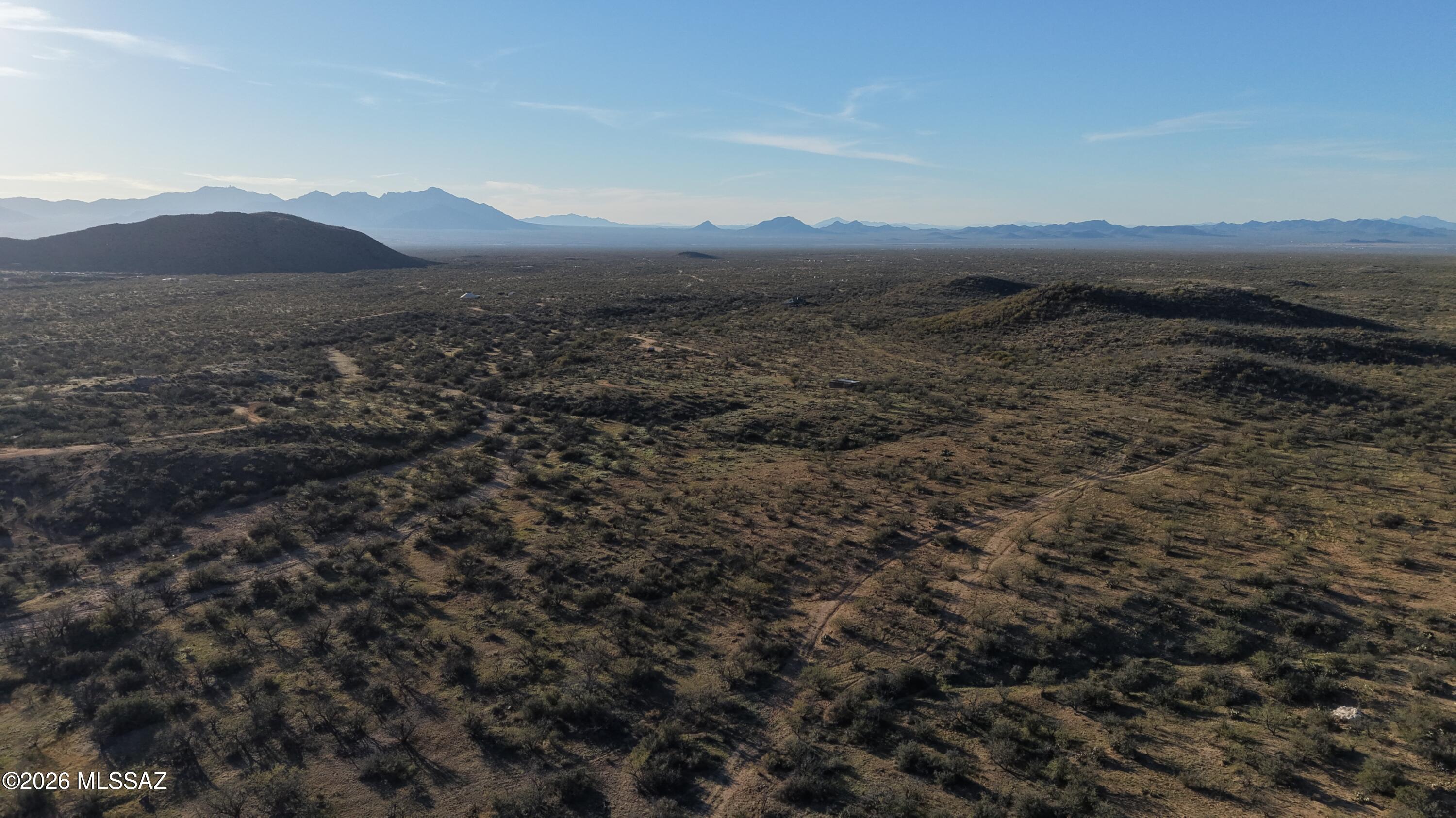 17027 South Sierrita Mountain Road Tucson, AZ 85736 - Photo 25 of 34 a view of a town with mountains in the background