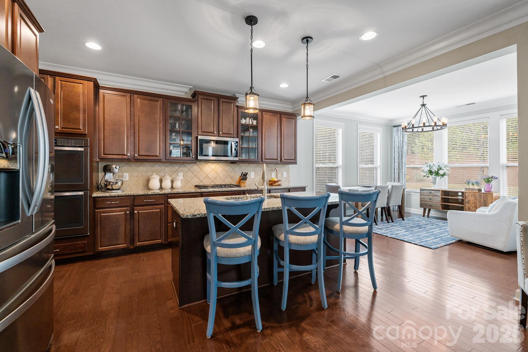 2072 Clarion Drive Fort Mill, SC 29707 - Photo 13 of 47 a large kitchen with a table and chairs