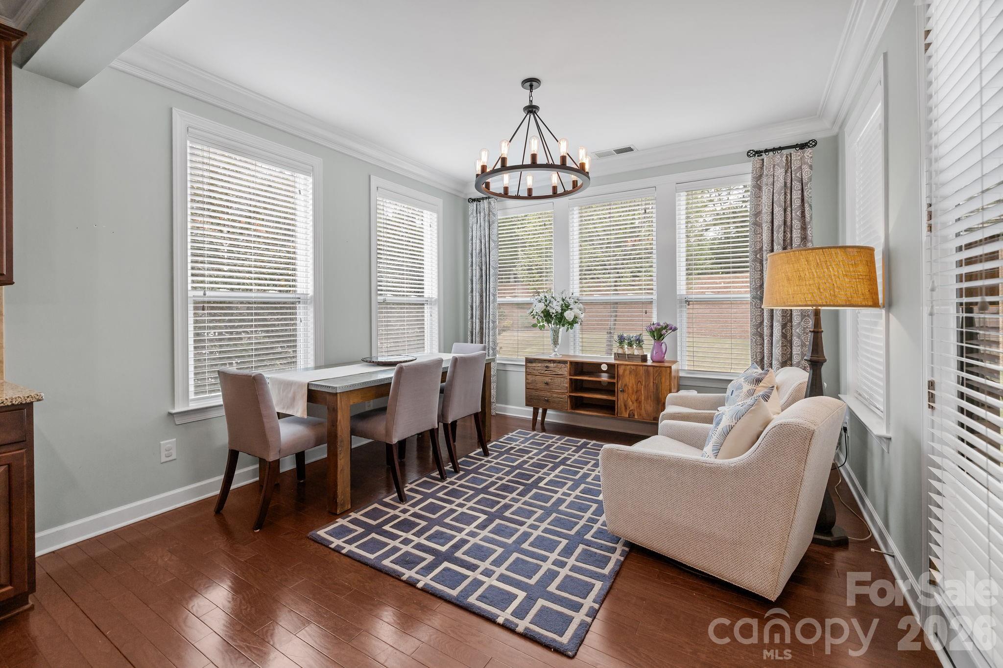 2072 Clarion Drive Fort Mill, SC 29707 - Photo 14 of 47 a living room with furniture and a chandelier