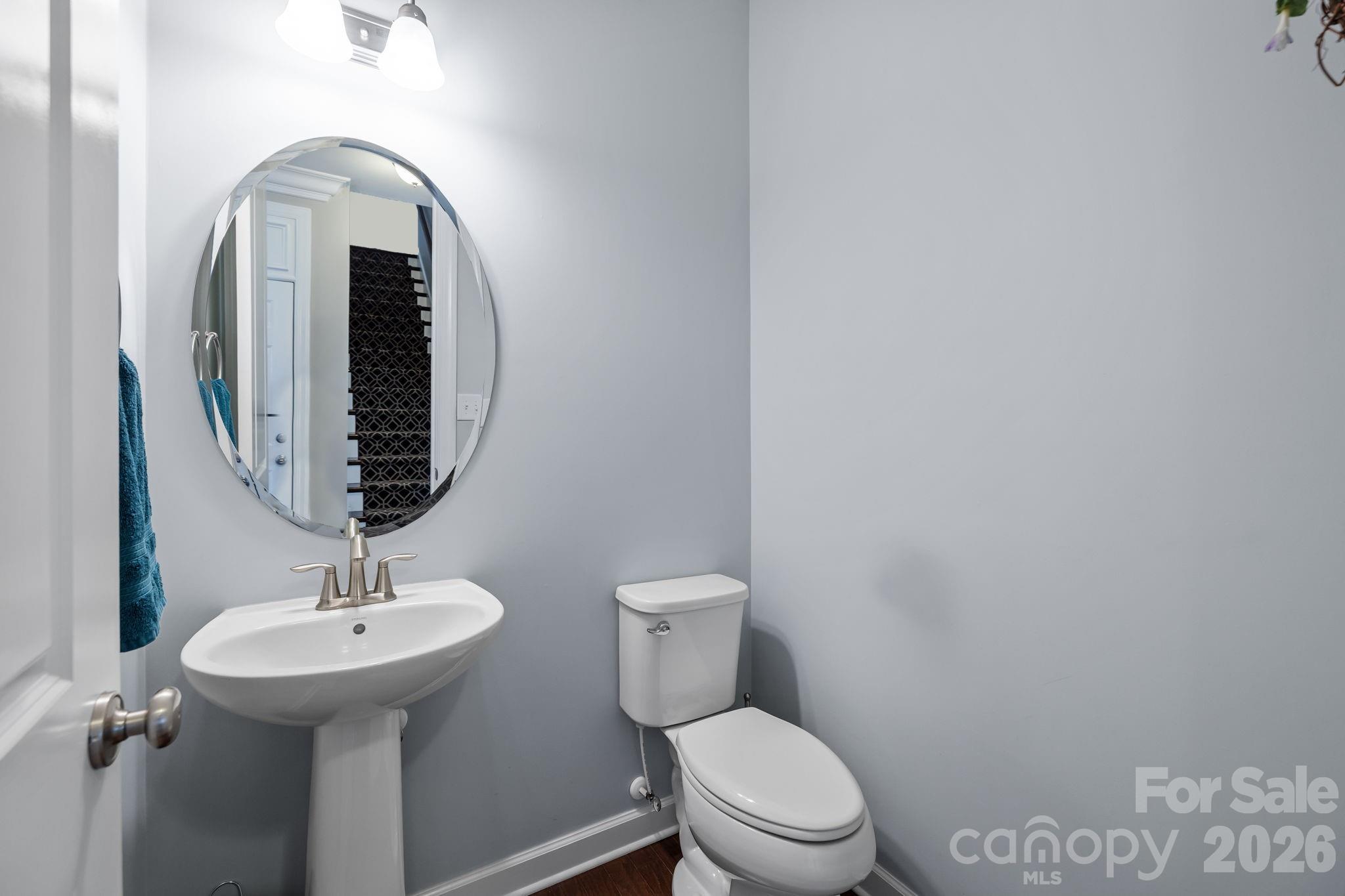 2072 Clarion Drive Fort Mill, SC 29707 - Photo 21 of 47 a bathroom with a toilet sink and mirror