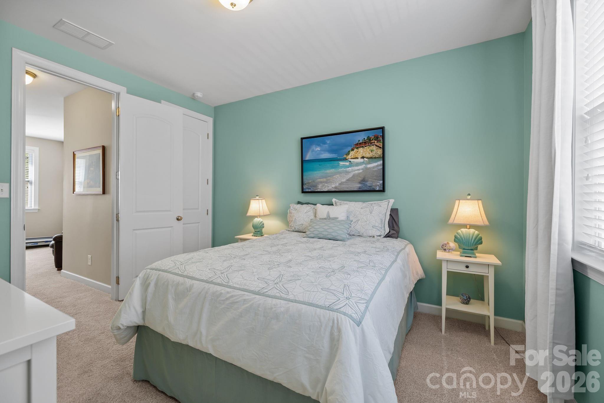 2072 Clarion Drive Fort Mill, SC 29707 - Photo 26 of 47 a bedroom with a bed and a painting on the wall