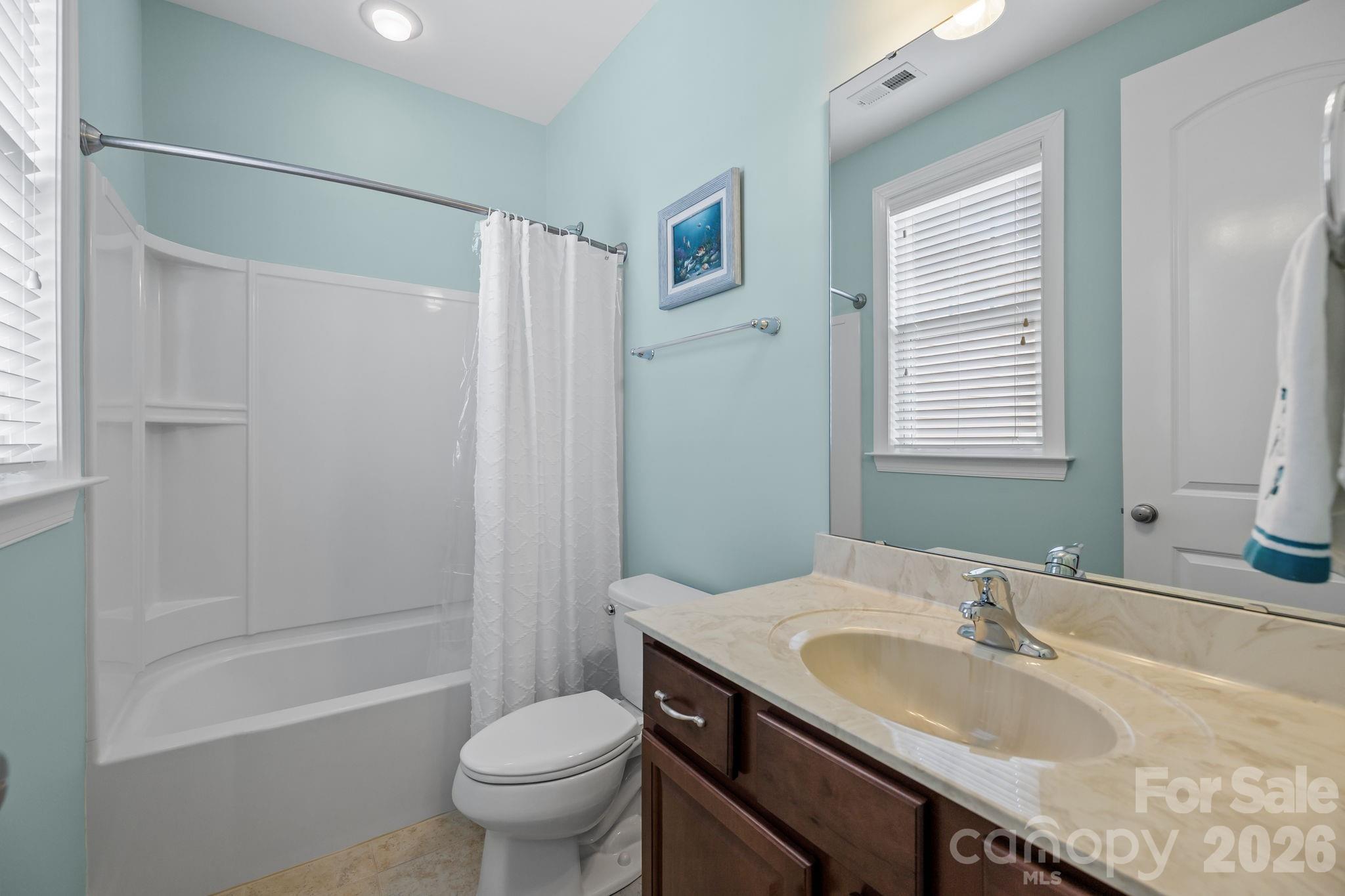 2072 Clarion Drive Fort Mill, SC 29707 - Photo 27 of 47 a bathroom with a granite countertop sink toilet and shower
