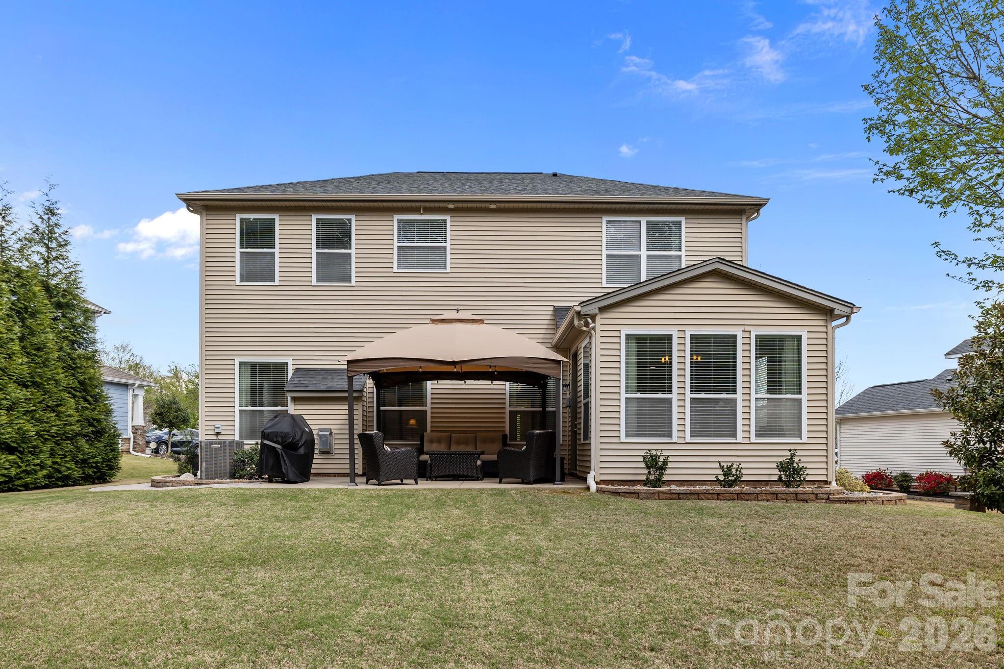 2072 Clarion Drive Fort Mill, SC 29707 - Photo 36 of 47 a front view of a house with a garden