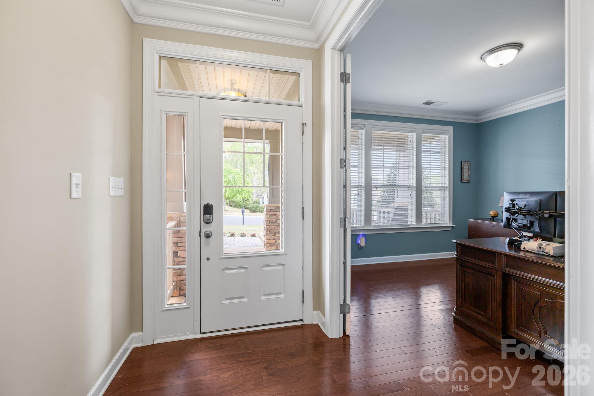 2072 Clarion Drive Fort Mill, SC 29707 - Photo 4 of 47 an empty room with wooden floor and windows