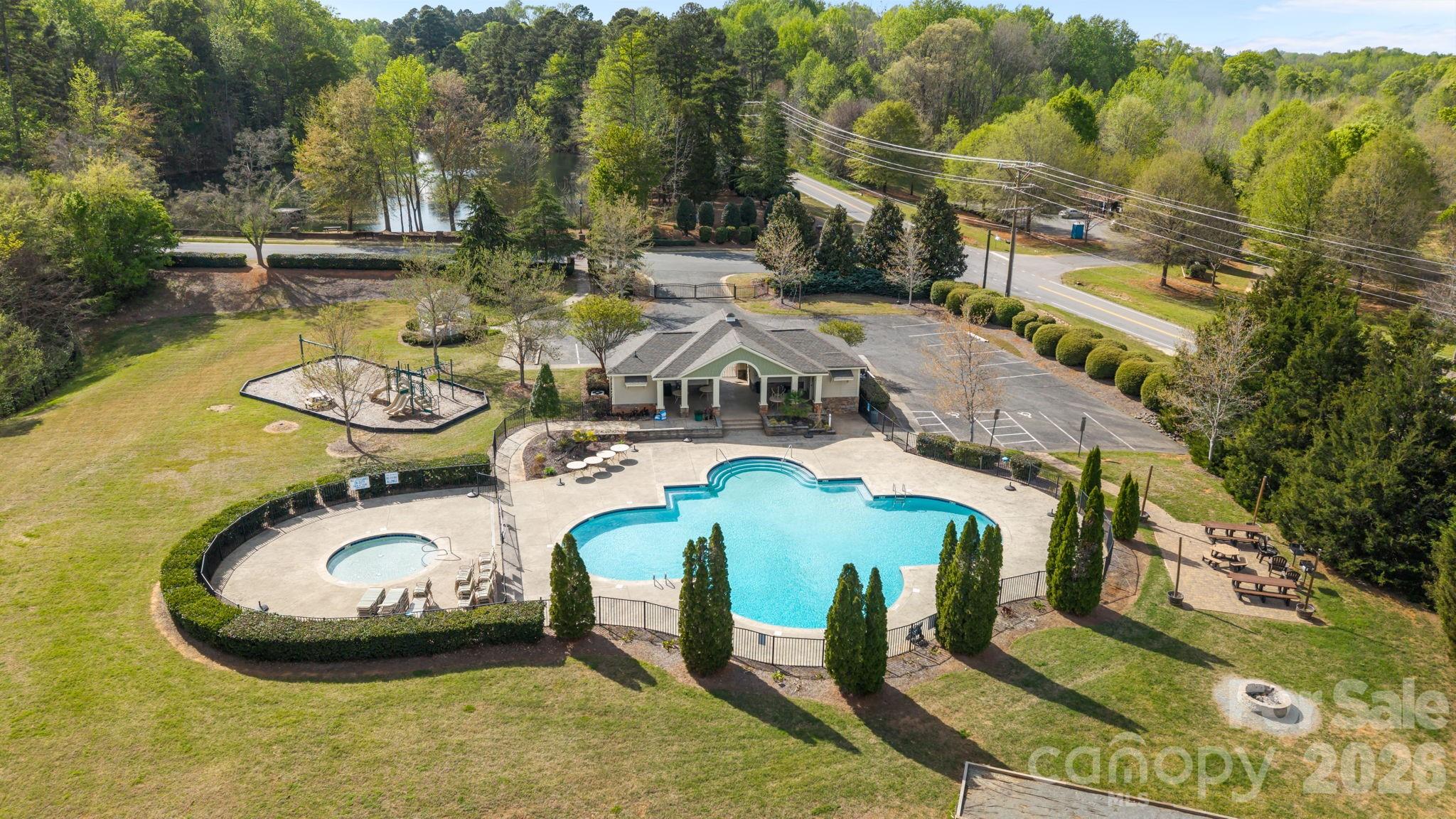 2072 Clarion Drive Fort Mill, SC 29707 - Photo 46 of 47 an aerial view of a swimming pool with lawn chairs and plants