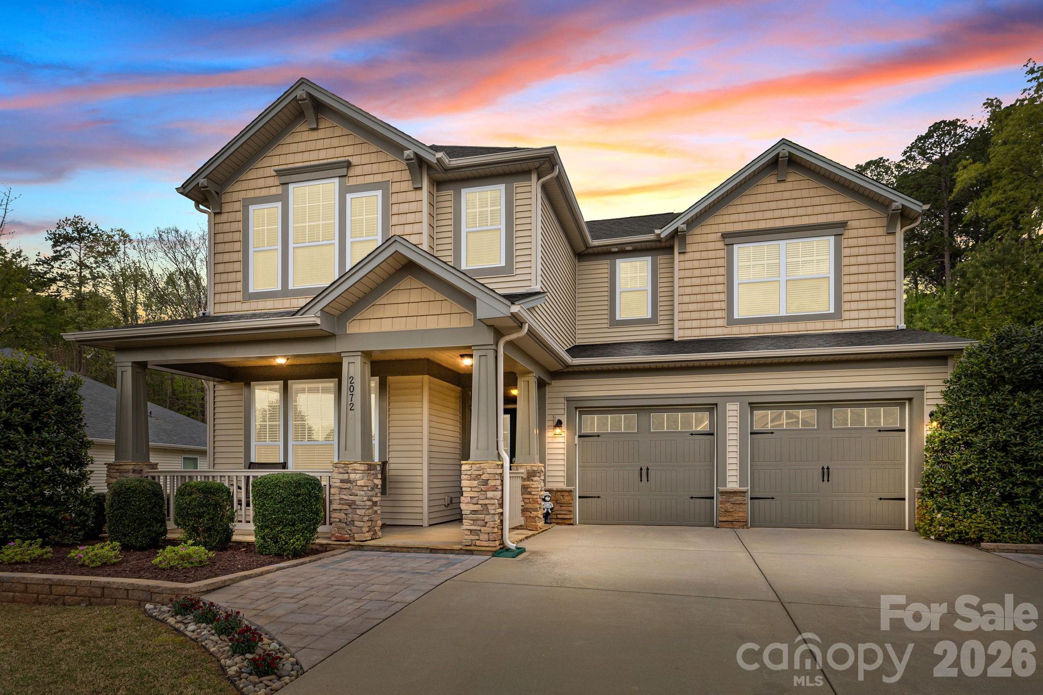 2072 Clarion Drive Fort Mill, SC 29707 - Photo 47 of 47 a front view of a house with a yard and garage