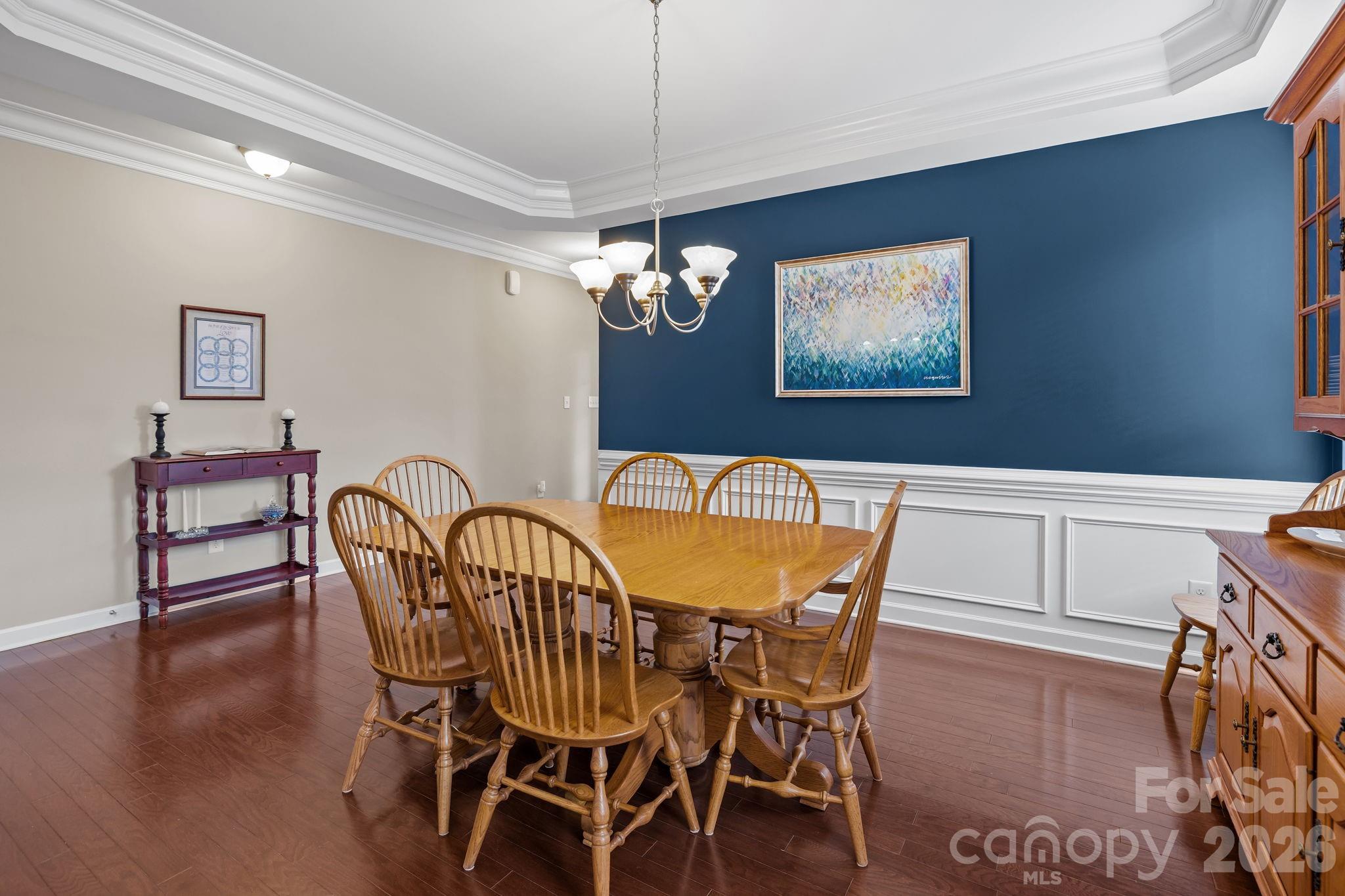 2072 Clarion Drive Fort Mill, SC 29707 - Photo 8 of 47 a view of a dining room with furniture and wooden floor