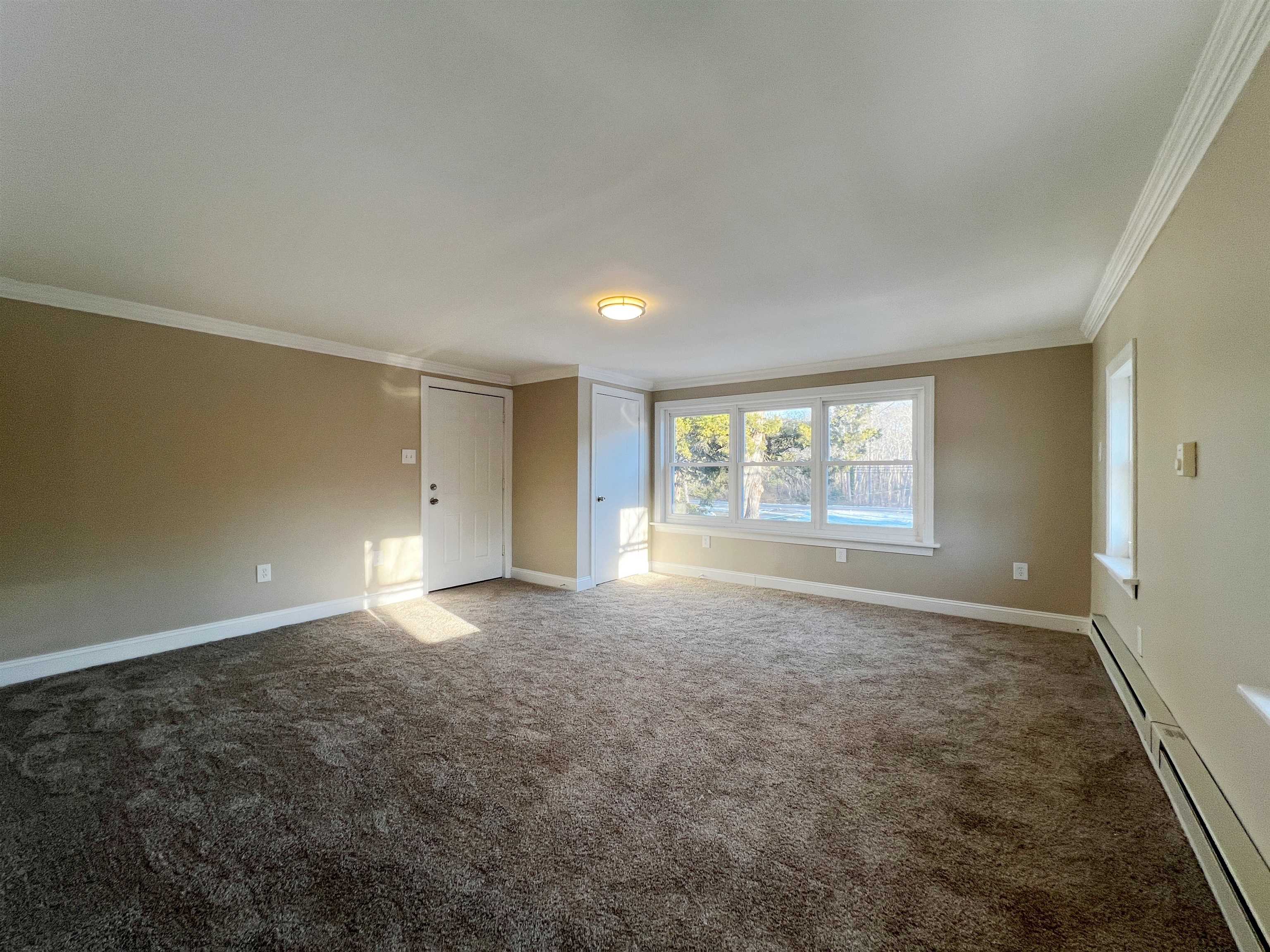 1340 Highway 9 Palermo, NJ 08230 - Photo 18 of 32 an empty room with windows and closet
