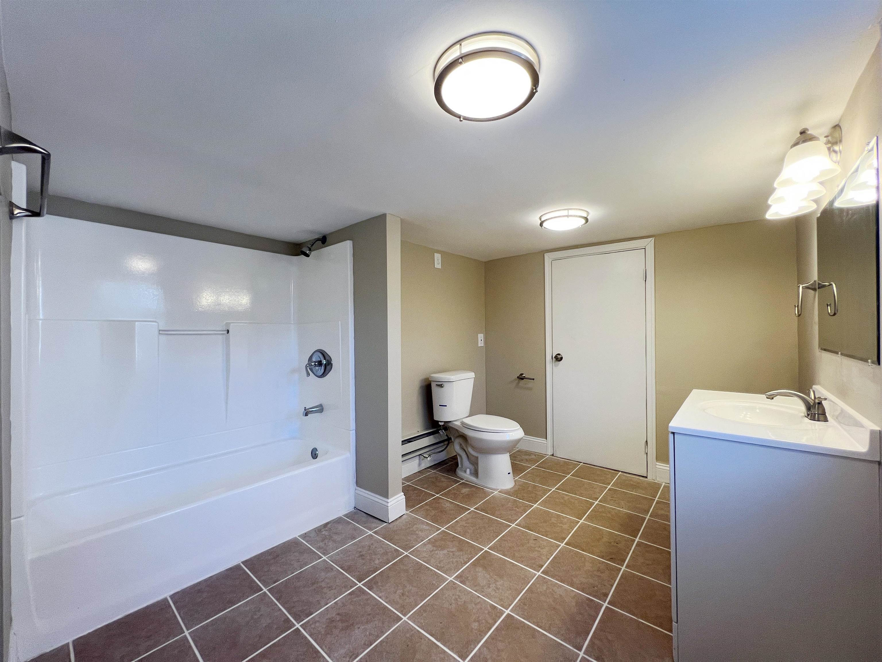 1340 Highway 9 Palermo, NJ 08230 - Photo 28 of 32 a bathroom with a sink a toilet and shower