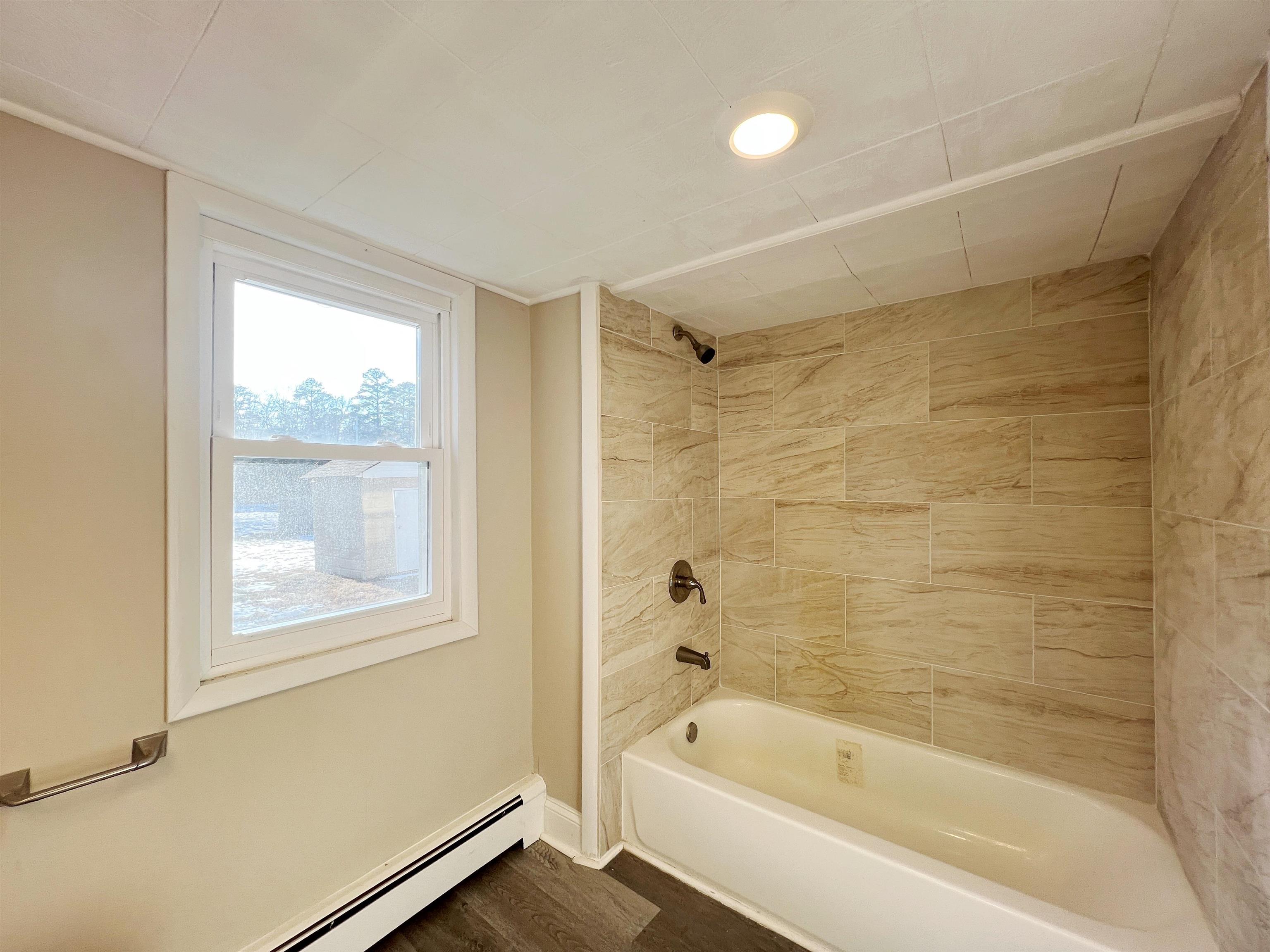 1340 Highway 9 Palermo, NJ 08230 - Photo 32 of 32 a bathroom with a bathtub and a shower