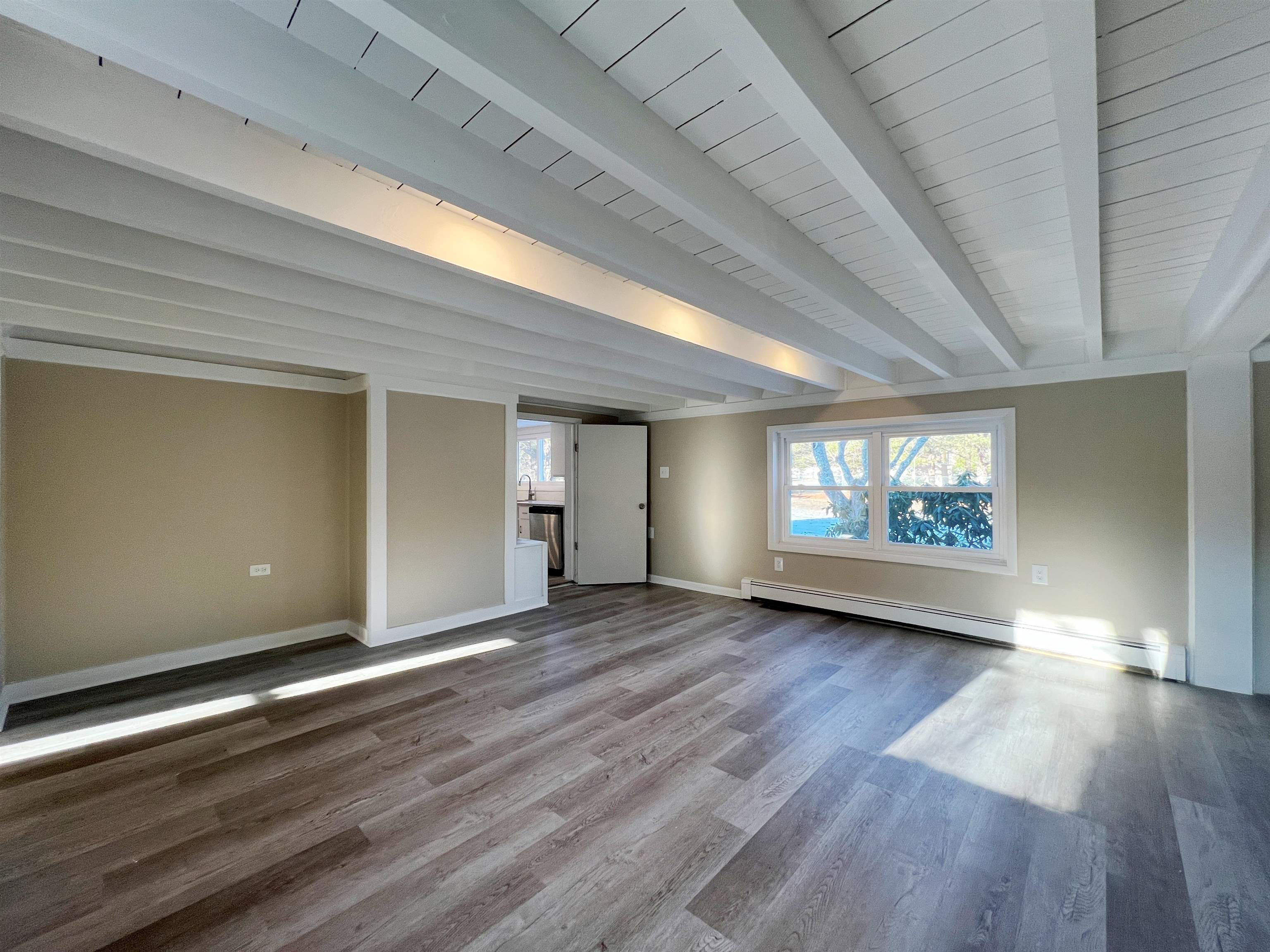 1340 Highway 9 Palermo, NJ 08230 - Photo 8 of 32 an empty room with wooden floor and windows