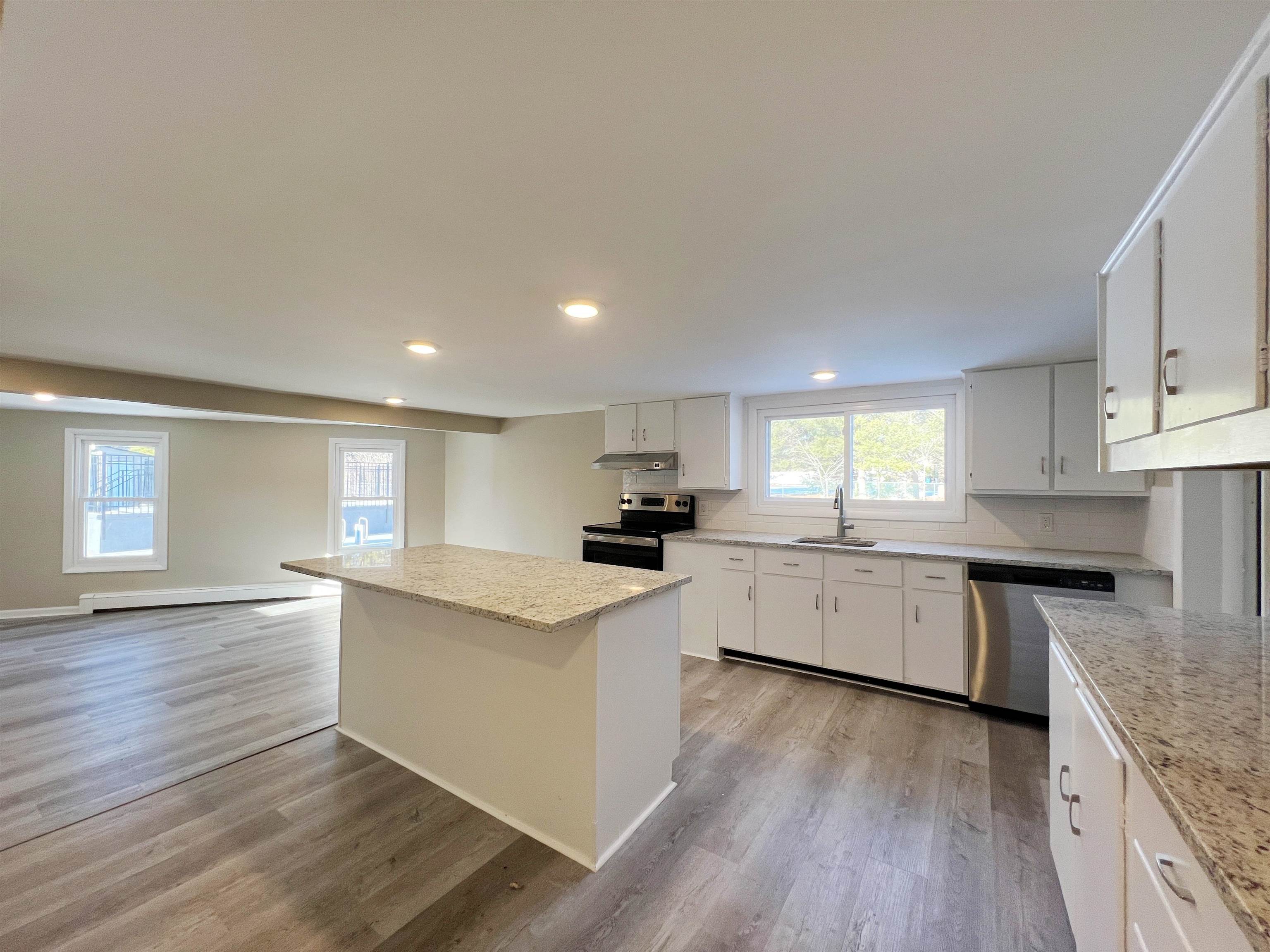1340 Highway 9 Palermo, NJ 08230 - Photo 10 of 32 a kitchen with granite countertop a sink cabinets and wooden floor